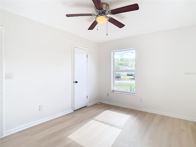 empty room featuring light hardwood / wood-style floors and ceiling fan