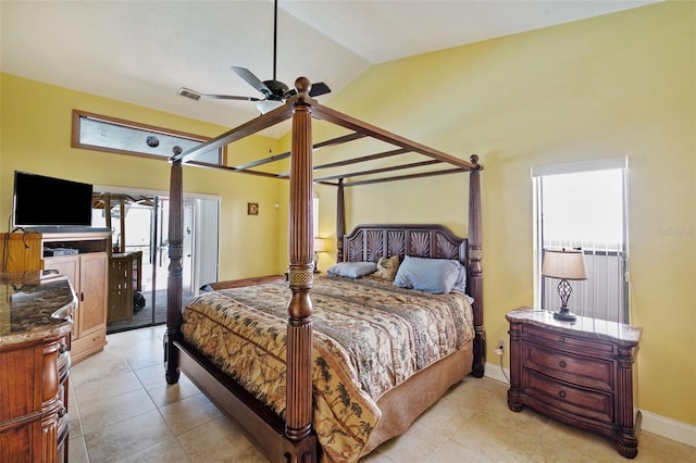 bedroom with light tile patterned floors, high vaulted ceiling, and ceiling fan