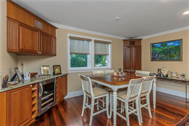 dining room featuring dark hardwood / wood-style floors, beverage cooler, and ornamental molding