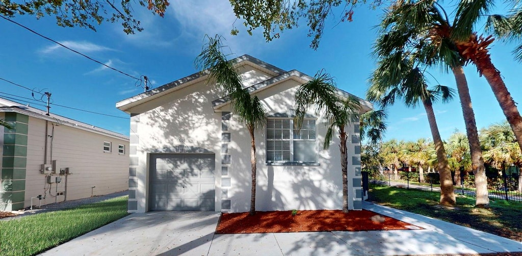 view of front of property featuring a garage