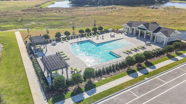 birds eye view of property featuring a water view