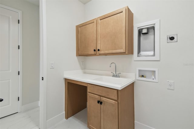 clothes washing area featuring cabinets, washer hookup, hookup for an electric dryer, and sink