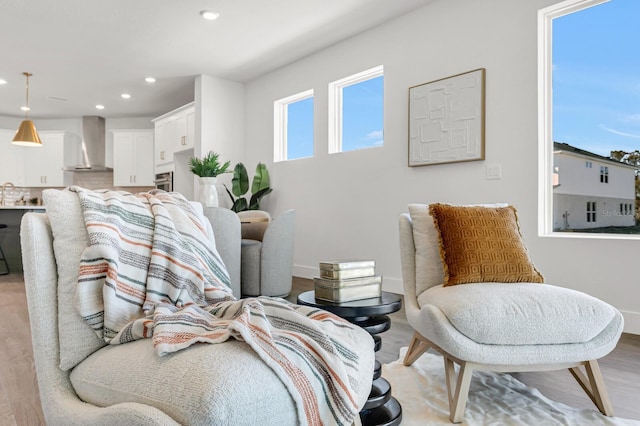 bedroom featuring recessed lighting, light wood finished floors, and baseboards