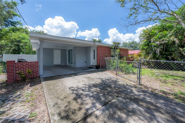 view of front of property with a carport