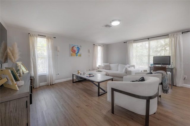 living room with light wood-type flooring