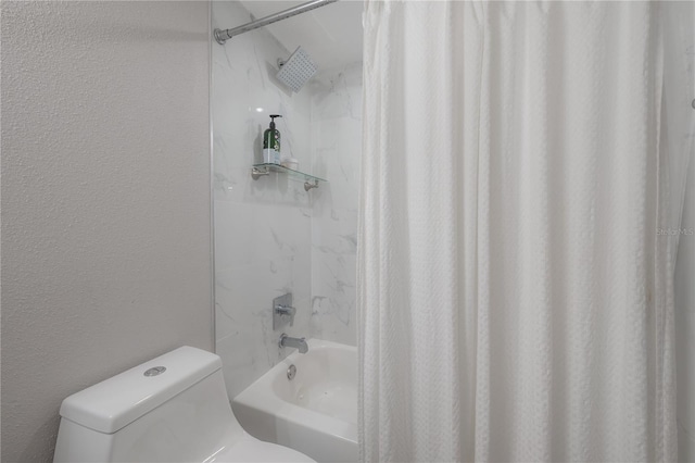 bathroom with shower / bath combo with shower curtain