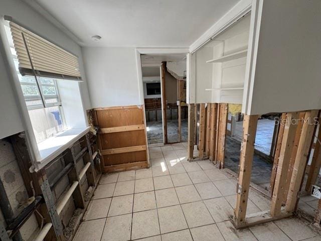 interior space featuring light tile patterned floors