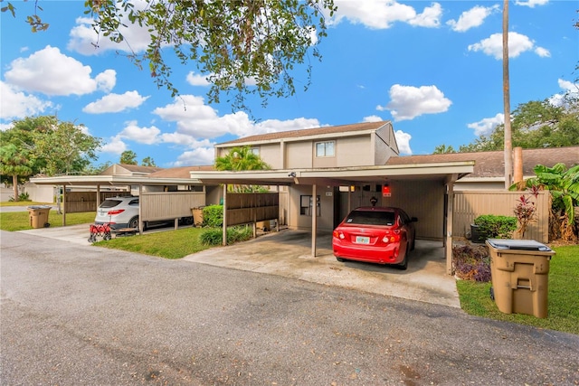 view of front of home with a carport