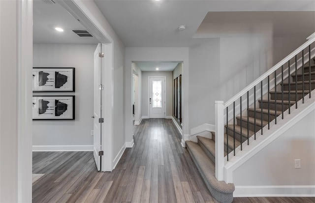 foyer with wood-type flooring