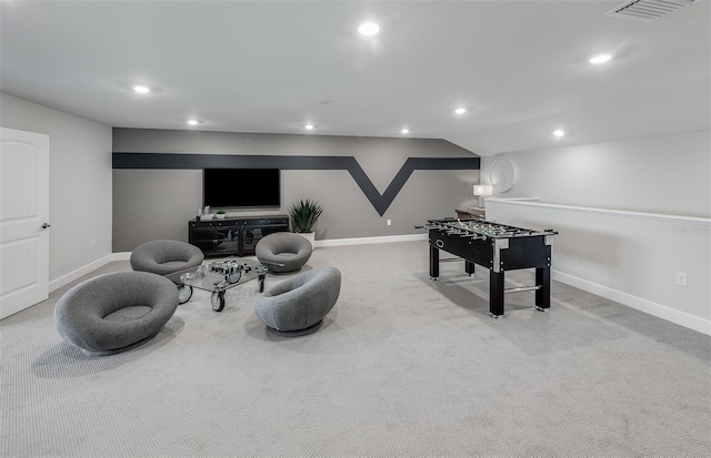 game room with light colored carpet