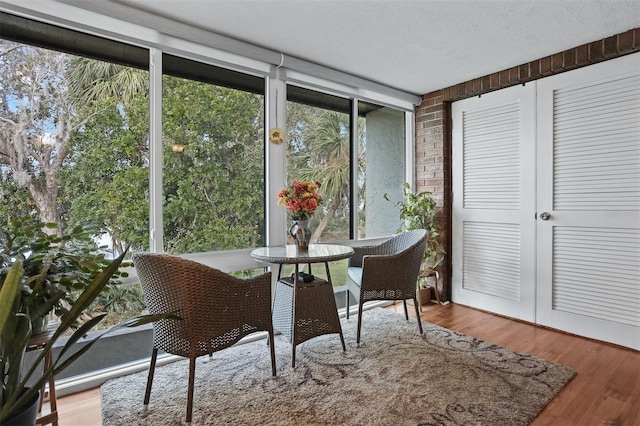 sunroom featuring a healthy amount of sunlight