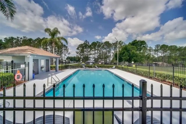 view of pool with a patio