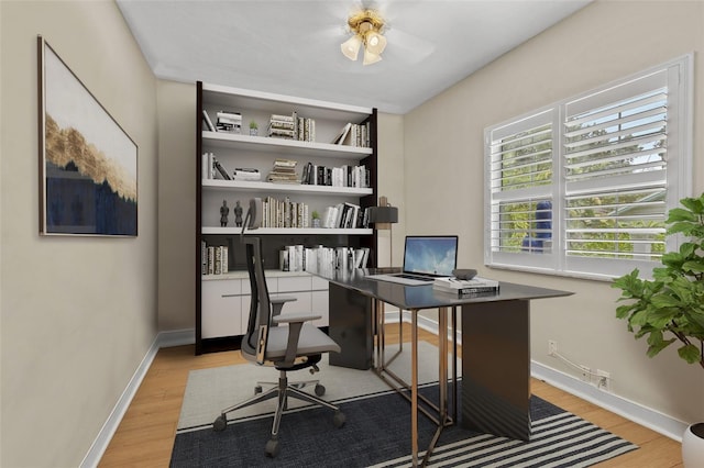 office space with light hardwood / wood-style floors