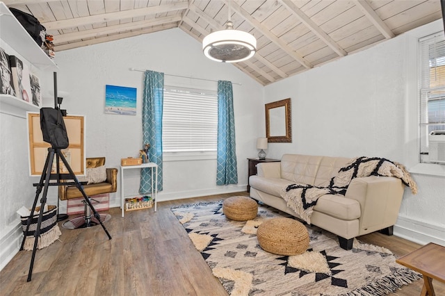 living room with vaulted ceiling with beams, wood-type flooring, and wood ceiling