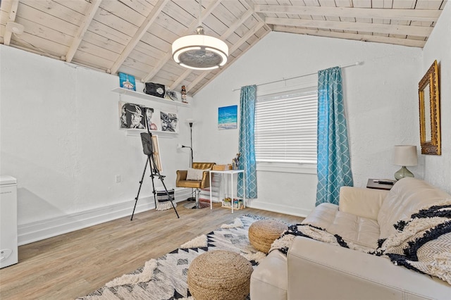 living area with vaulted ceiling with beams, wood ceiling, and light wood-type flooring