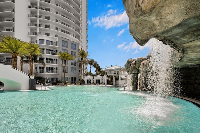 view of pool featuring pool water feature