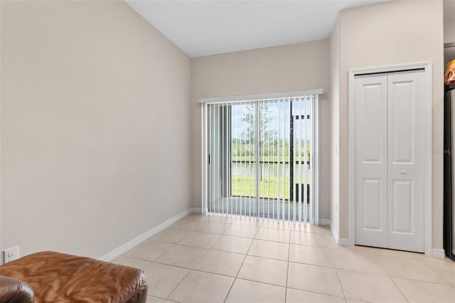 view of tiled spare room