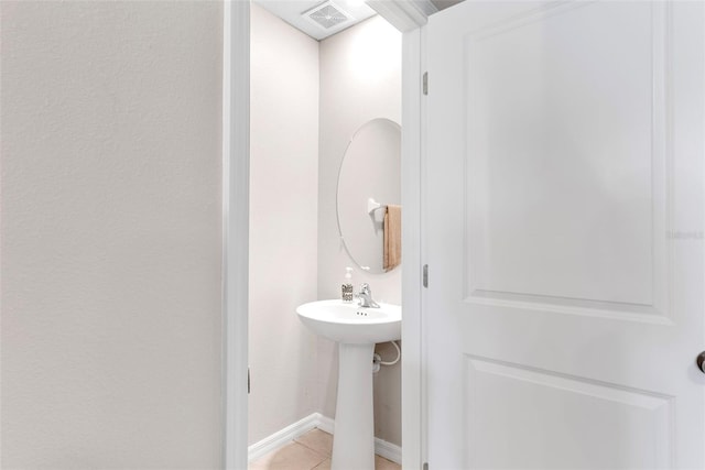 bathroom featuring tile patterned flooring