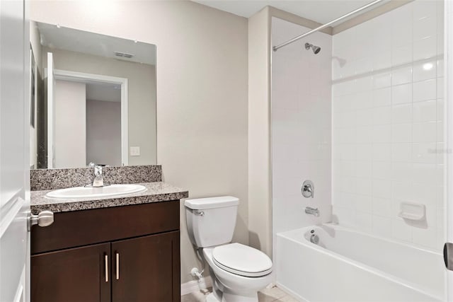 full bathroom with vanity, toilet, and tiled shower / bath