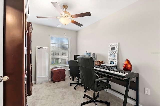 office with light colored carpet and ceiling fan