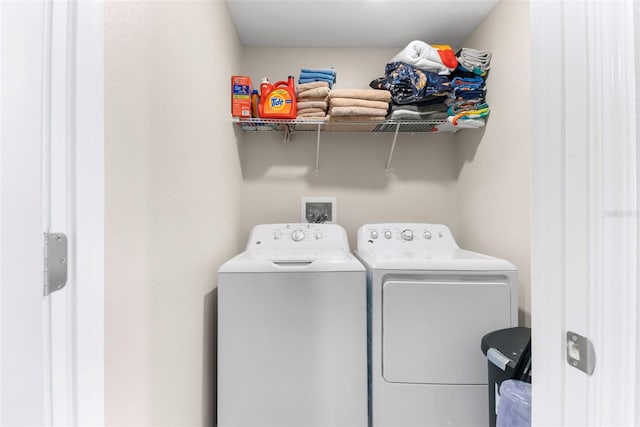 washroom featuring separate washer and dryer