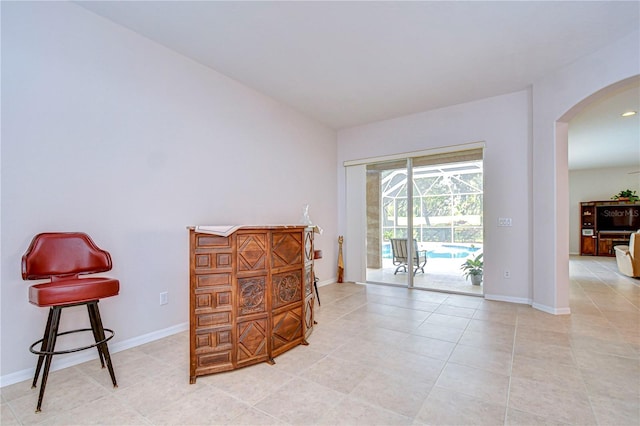 living area with light tile patterned floors