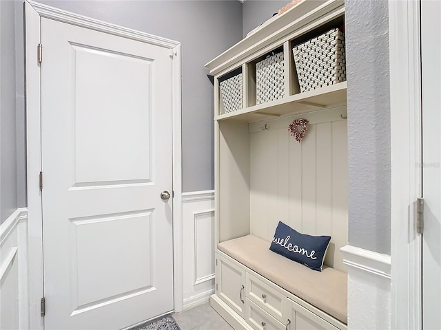 mudroom with light tile patterned floors