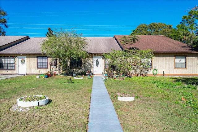 view of front of home with a front lawn