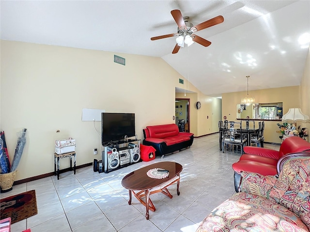 tiled living room featuring ceiling fan with notable chandelier and lofted ceiling