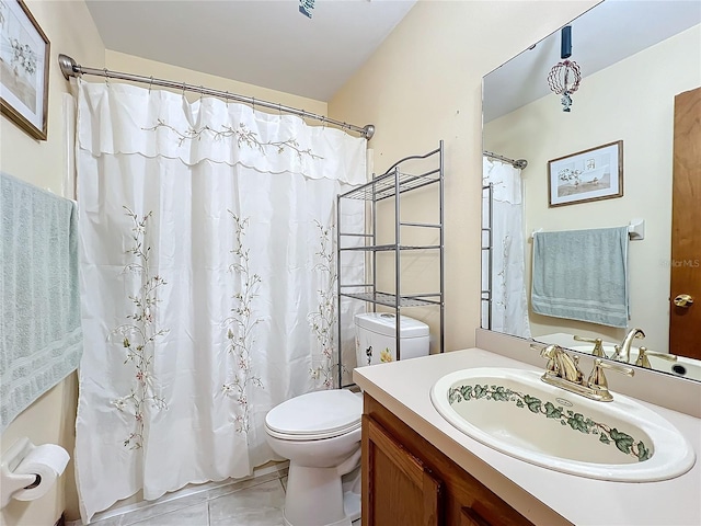 bathroom featuring walk in shower, tile patterned flooring, vanity, and toilet