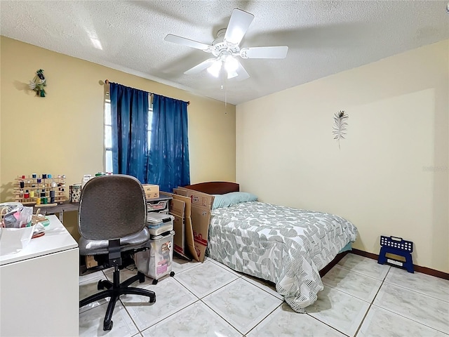 tiled bedroom with ceiling fan, a textured ceiling, and fridge