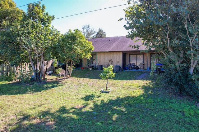 view of yard with central AC