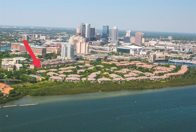 drone / aerial view with a water view