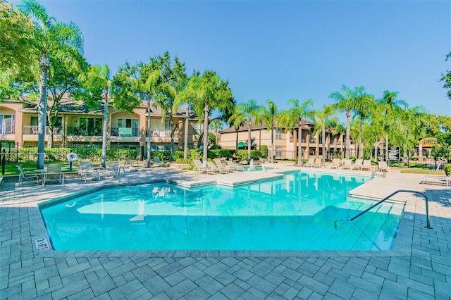 view of swimming pool with a patio