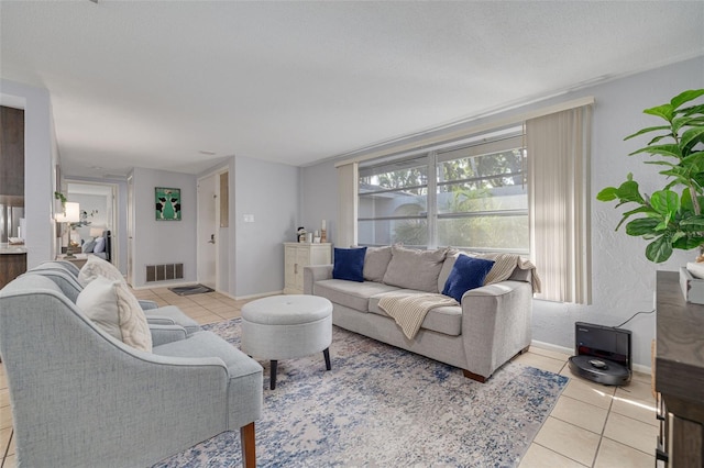 living room featuring light tile patterned floors