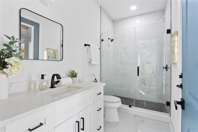 bathroom with toilet, recessed lighting, vanity, marble finish floor, and a marble finish shower