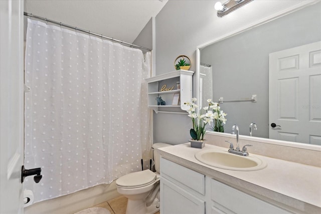 full bathroom featuring tile patterned flooring, vanity, shower / tub combo with curtain, and toilet