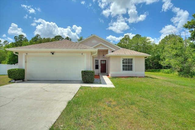 single story home featuring a garage and a front lawn