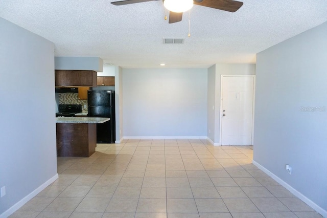 kitchen with decorative backsplash, black appliances, a textured ceiling, light tile patterned floors, and ceiling fan