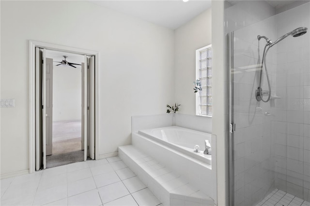 bathroom with plus walk in shower, tile patterned floors, and ceiling fan