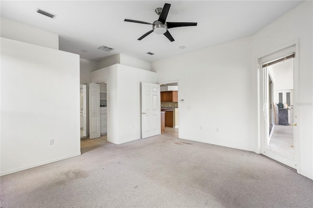 unfurnished bedroom with light carpet and ceiling fan