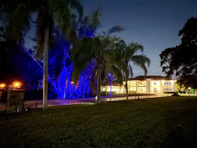 view of yard at night