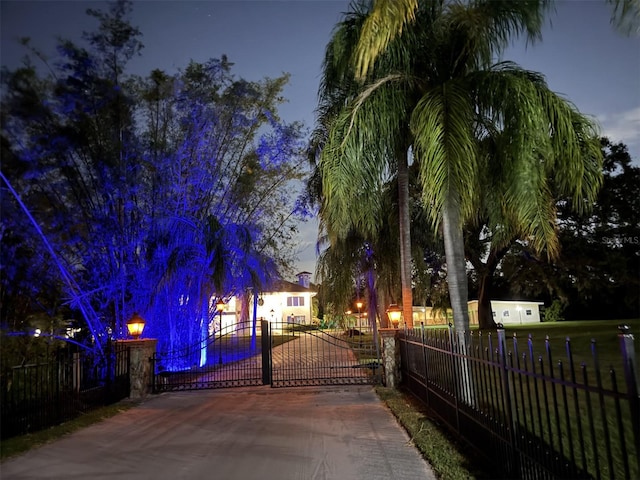 view of gate at dusk