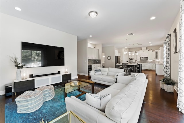 living room featuring dark hardwood / wood-style flooring