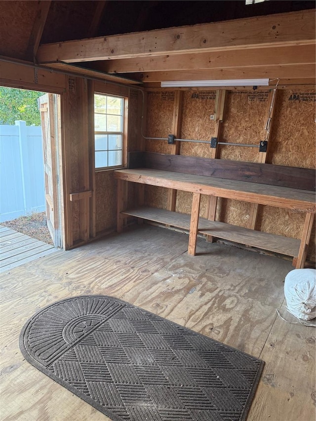 basement with hardwood / wood-style floors