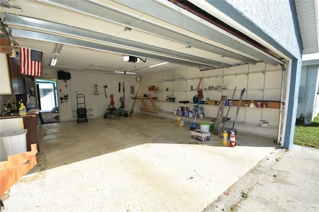 garage featuring a garage door opener