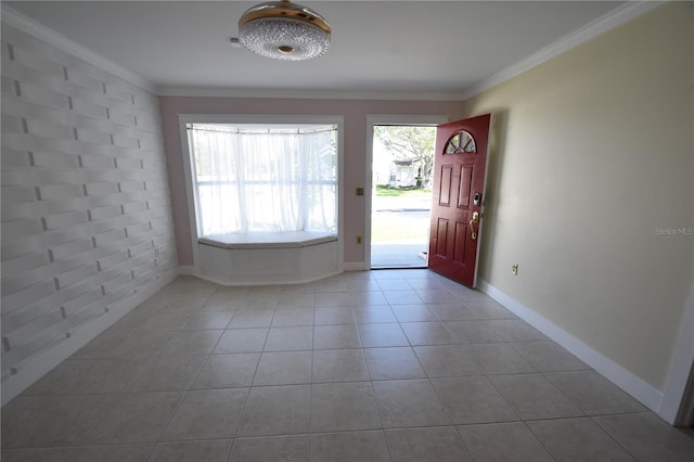 entryway featuring light tile patterned flooring, brick wall, and ornamental molding