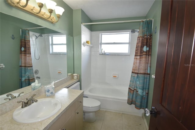 full bathroom featuring tile patterned flooring, shower / bath combo, vanity, and plenty of natural light