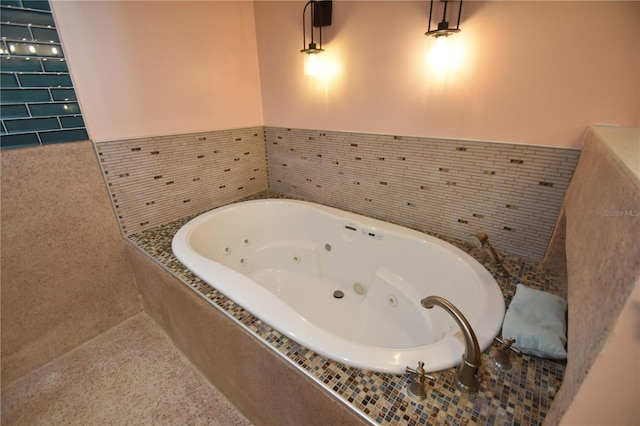 bathroom with tiled tub