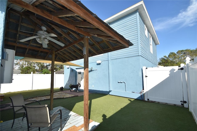 view of yard with a gazebo and ceiling fan